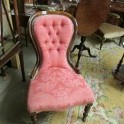 A mahogany ladies chair.