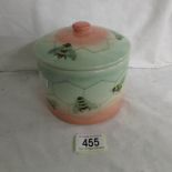 A Sally Tuffin honey bee lidded pot, dated 2000, No 44. Some crazing to lid.