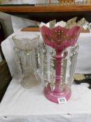 A Victorian pink glass lustre and one other.