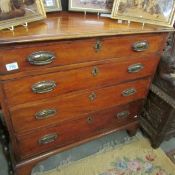 A 4 drawer mahogany chest.