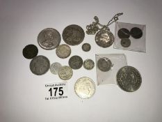 A collection of early silver coins, £5 coin etc.