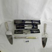 2 silver handled cake slices, 3 silver handled knives and a silver handled pickle fork.