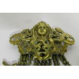 An Art Nouveau style metal brooch marked style metal spec. NY.