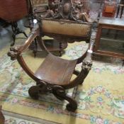 A 19th century carved hall chair.