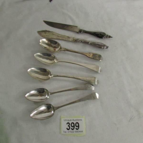 5 silver teaspoons, a letter opener and a knife.