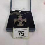 A Scottish Celtic millefiori set pendant in silver in a shield design, maker C.J.