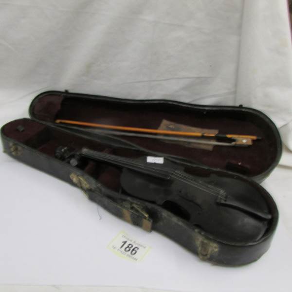 A small late Victorian wooden violin in original case, 12" long (missing bridge). - Image 2 of 21