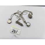 A mixed lot of silver lockets, chains, brooch, etc.