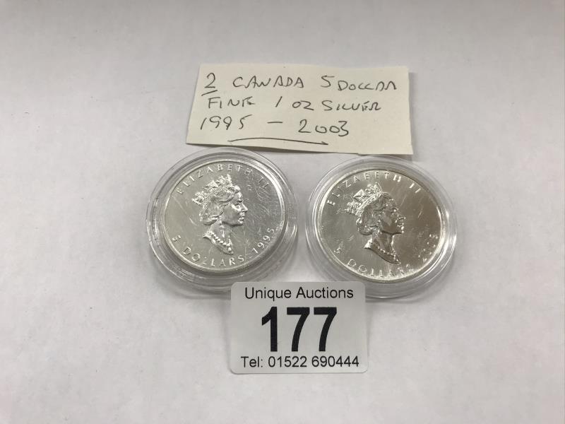 2 Canadian 5 dollar fine 1 ounce silver coins, dated 1995 and 2003.
