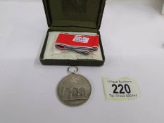 A Nazi Germany Adolf Hitler 800 silver 'Blood Medal', second issue No. 3520 with box.