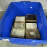 A large collection of 3" x 4" celluloid and glass negatives contained in 27 boxes.