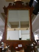 A Victorian mahogany framed mirror.