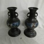 A pair of Cloissonne vases.