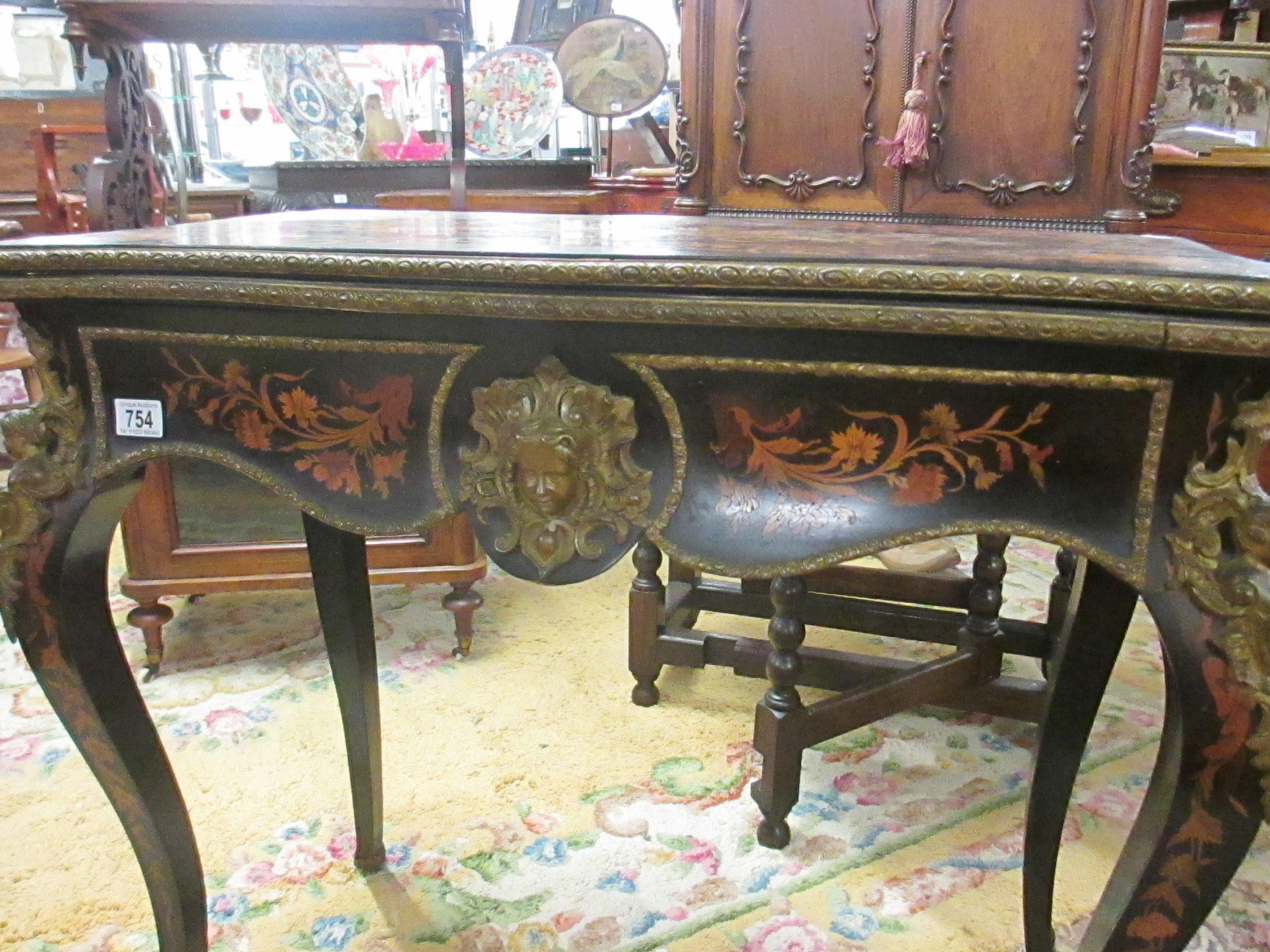 A Victorian marquetry inlaid card table. - Image 7 of 18