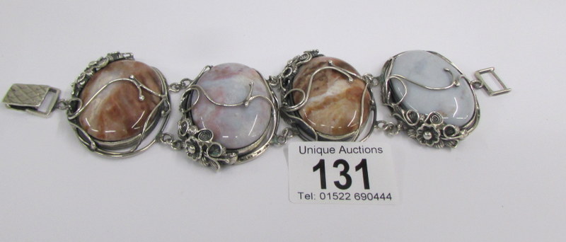 A very lovely multi coloured agate bracelet with garlands of flowers in silver.