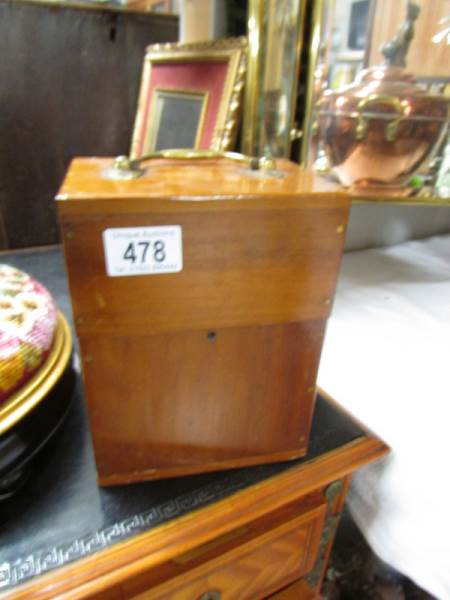 A 4 compartment mahogany knife box.