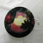 A Moorcroft plate, 23 cm diameter.