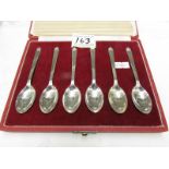 A cased set of hallmarked silver teaspoons with crown finials, approximately 85 grams.