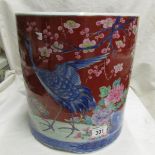 A large hand painted Chinese pot depicting birds.