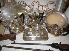 A mixed lot of silver plate including teapot, coffee pots, trays etc.