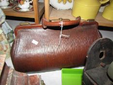 A vintage Gladstone bag.