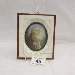 A framed oval miniature portrait of a gentleman.