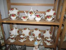 A Royal Albert Old Country Roses 22 piece tea set.