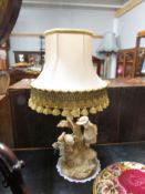 A Royal Worcester table lamp with shade,