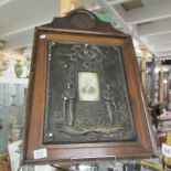 A First World War cast plaster memorial frame with bronzed finish complete with photograph and