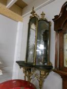 A rare and unusual Georgian triple gilt mirror of an ecclesiastical design from late 18th century.