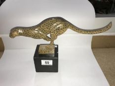 A rare bronze two tone sprinting cheetah in cubist design, approximate length 33 cm.