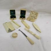 Ten pieces of ivory including 2 ring boxes and an earring box.