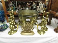 A brass jam pan, brass trivet and 3 pairs of brass candlesticks.