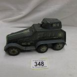 A West German tinplate friction armoured car by Arnold, Germany.