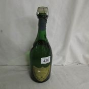 A bottle of Moet et Chandon a Epernay Champagne, Cuvee Dom Perignon, vintage 1961.