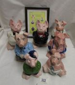 A set of 7 Wade National Westminster Bank / Nat West pigs including rare example in white dinner