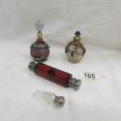 A double ended ruby glass scent bottle with plated fittings,