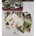 A mixed lot of old postcards, photographs, negatives etc.