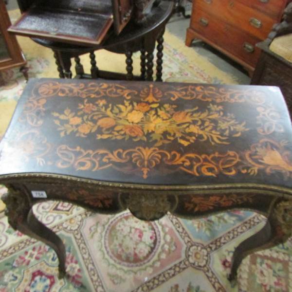 A Victorian marquetry inlaid card table. - Image 5 of 18