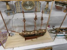 A model of a galleon / sailing ship in plastic case.