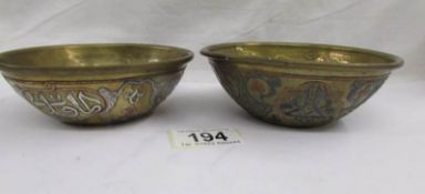 2 19th century Mamluk brass bowls overlaid with silver and copper.