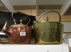 A Victorian copper kettle and a brass jam pan.