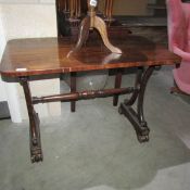 A rosewood side table.