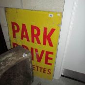 A Park Drive cigarettes sign.