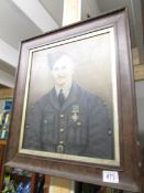 An oak framed portrait painting by J. H. Speechley of an R.A.F.