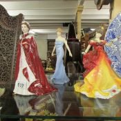 2 Royal Doulton figures being Diana and Belle together with a Royal Worcester figure of Queen