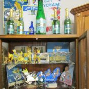 3 shelves of assorted Babycham collectables.