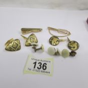 A collection of vintage cuff links, tie pins, collar studs etc. (12 items in total).