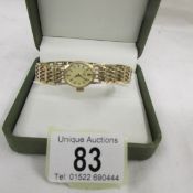 A gold ladies Rotary wrist watch with an openwork bracelet, total approximate weight 18 grams.