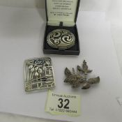 A Cornish Celtic brooch in pewter and 2 other brooches.